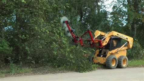 skid steer wood cutting attachments|tree trimmer attachment for tractor.